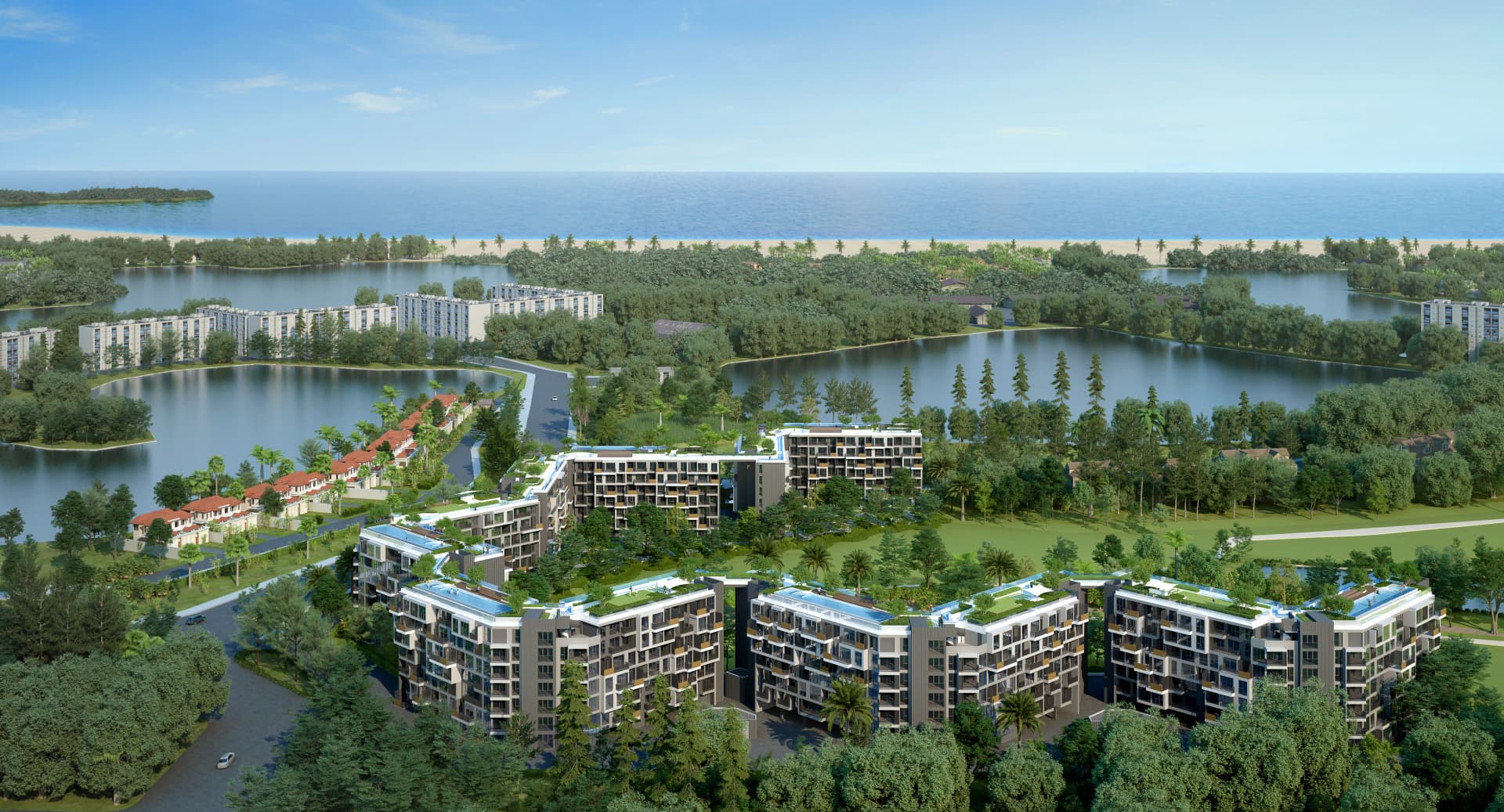 Rendering of the three blocks with planted roofs between the lagoons and Bang Tao Beach